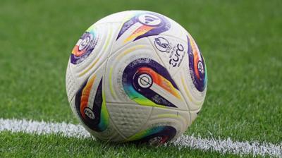 A football on a pitch
