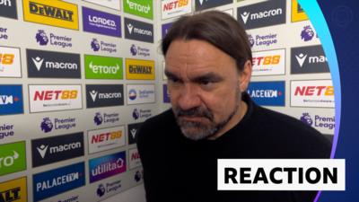 Daniel Farke in post match interview standing against advertising board