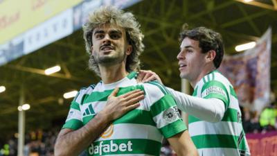 Jota celebrates scoring on his Celtic return