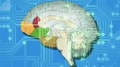 Diagram of a human brain overlaid with circuit board