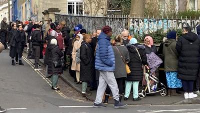 People standing in a queue