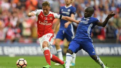 Arsenal midfielder Mesut Ozil and Chelsea's Ngolo Kante