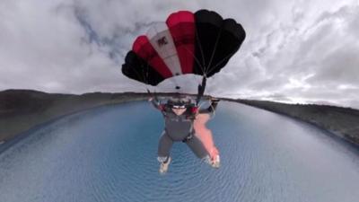 Andy Guest base jumping above Penrhyn Quarry