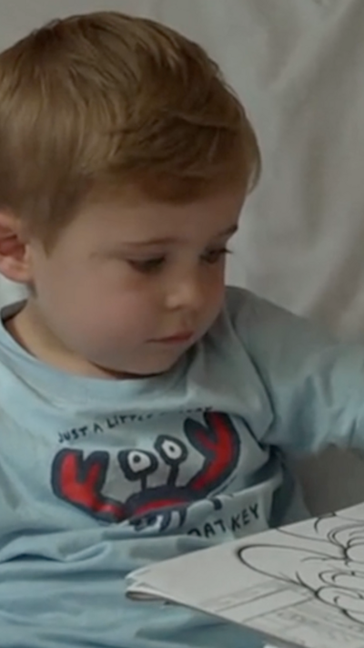 a child in bed in pajamas 