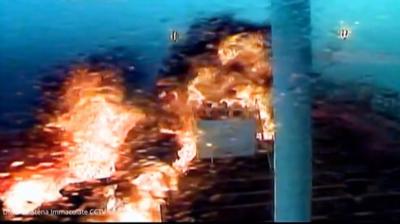 Image of an explosion after a cargo ship crashed into an oil tanker