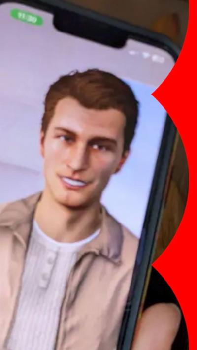 A phone held to camera with a male avatar on the screen.