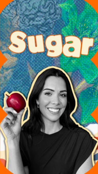 Nutritionist Dr Hazel Wallace holding an apple. The background is a blue and green graphic which contains the words 'Sugar'.