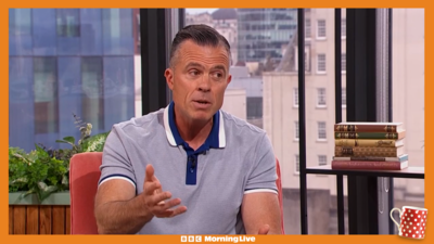 Marc Cananur in the Morning Live studio wearing a blue polo T-shirt