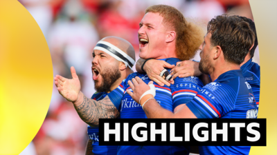 Caius Faatili and his Wakefield team-mates celebrate a try at Hull KR