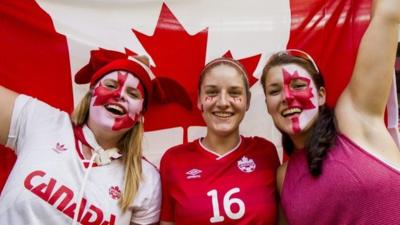 Canadian fans cheer their team prior to the FIFA Women's World Cup 2015 Quarter Final match between Canada and England in Vancouver, Canada,