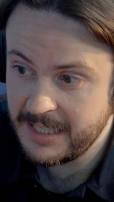 Close up of man talking urgently