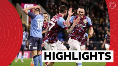 Burnley's Darko Churlinov celebrates with goalscorer Connor Roberts