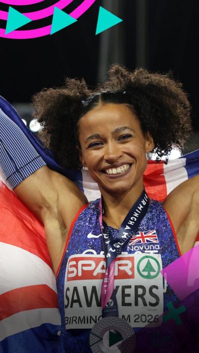 Jazmin Sawyers smiles tot he camera after winning silver in the women's long jump.