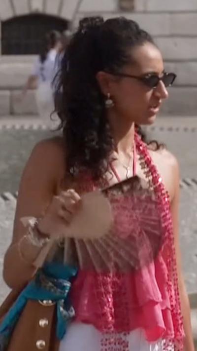 A woman walking along the street in Madrid