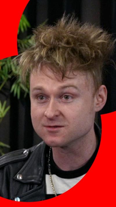 Musician Sam Battle looking directly at interviewer