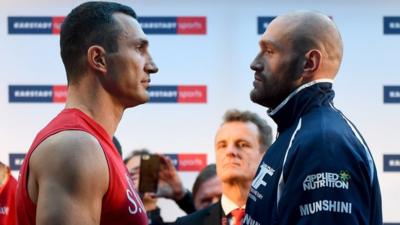 World heavyweight champion Wladimir Klitschko (l) and challenger Tyson Fury