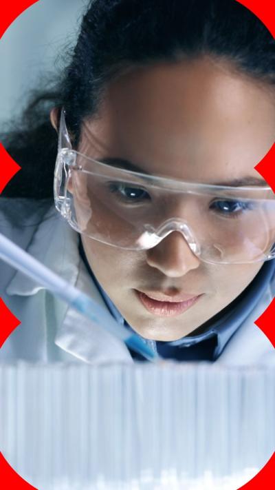 A woman wearing safety goggles 