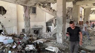 Mosque interior covered in rubble