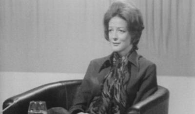 Maggie Smith sitting on a chair in studio during the interview