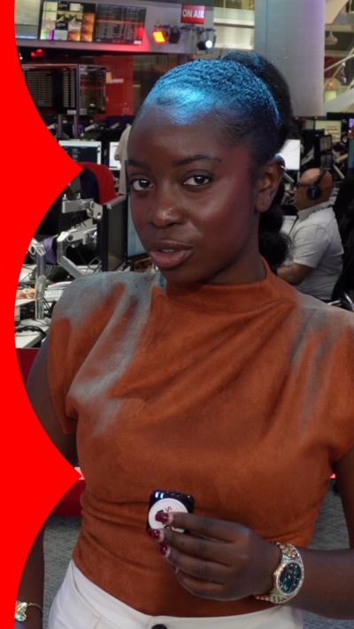 Journalist a close-up of Jonelle Awomoyi in the BBC newsroom