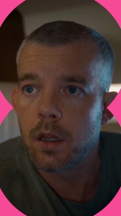 A man with a buzz cut looks shocked with his mouth agape