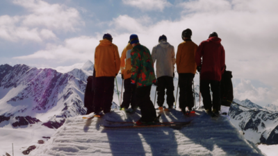 Freestyle skiers perform amazing jump routine