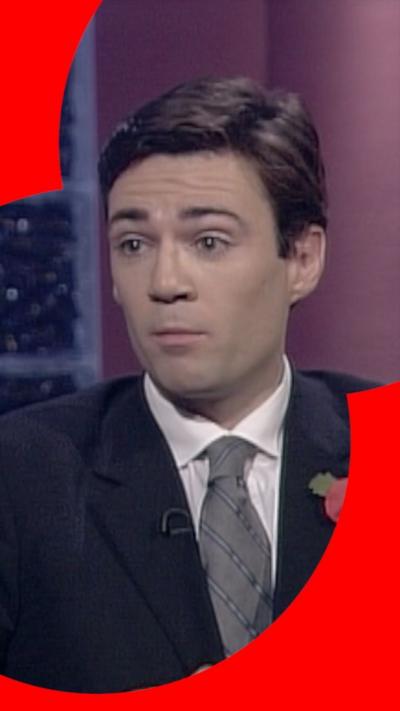 A young Andy Burnham in a black suit