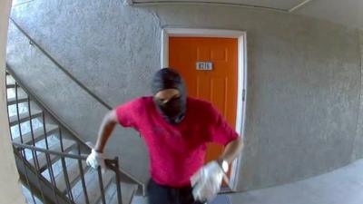 Man in ski-mask filmed from doorbell camera