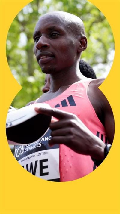 Sawe poses for a picture after winning the London Marathon.