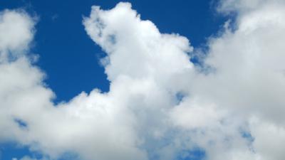 White fluffy clouds against a blue sky