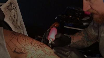 Tattoo being done