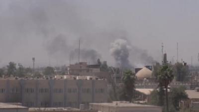 Smoke rises from the Old City of Mosul on 11 July 2017