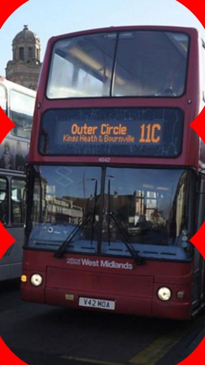 Red bus at bus stop in Birmingham with the words outer circle and the number 11.