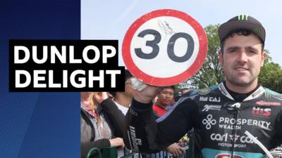 Michael Dunlop celebrates his 30th Isle of Man TT victory