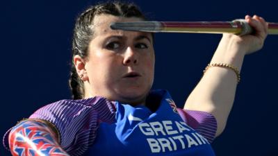 Hollie Arnold takes aim with the javelin