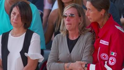 People hold a minute's silence in Genoa to mark a year since the Morandi motorway viaduct collapsed