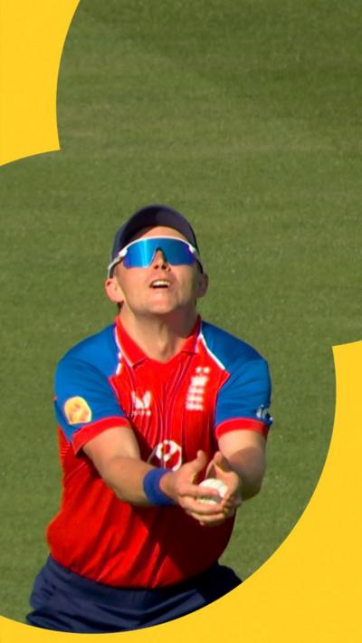 Sam Curran catching a ball as England play India in the men's international T20.