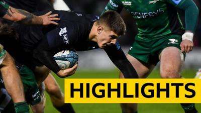 Joe Hawkins of Ospreys is tackled by Jack Carty of Connacht