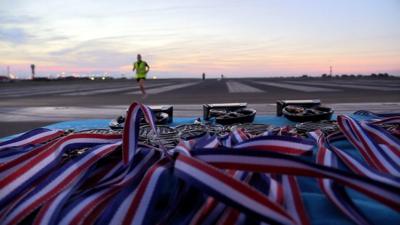 Runner on airport runway