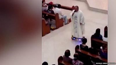 Priest rides a "'hoverboard" while singing in church