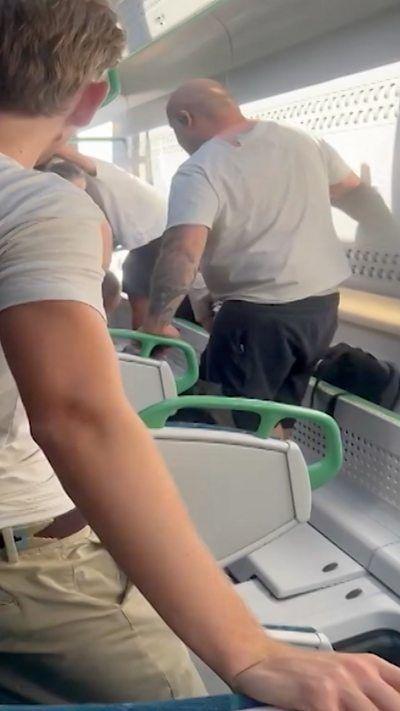 Screengrab showing inside derailed train carriage