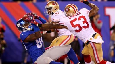 Larry Donnell makes a fingertip catch