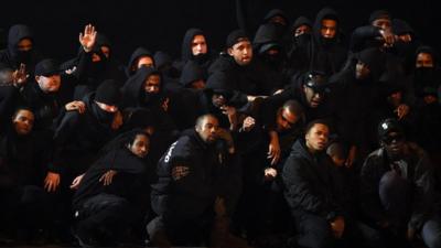 Kanye West on stage at Brit Awards 2015 with UK grime artists