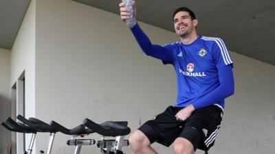 Kyle Lafferty takes part in a light training session