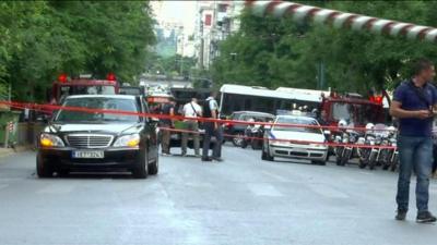 Police seal off car in Athens