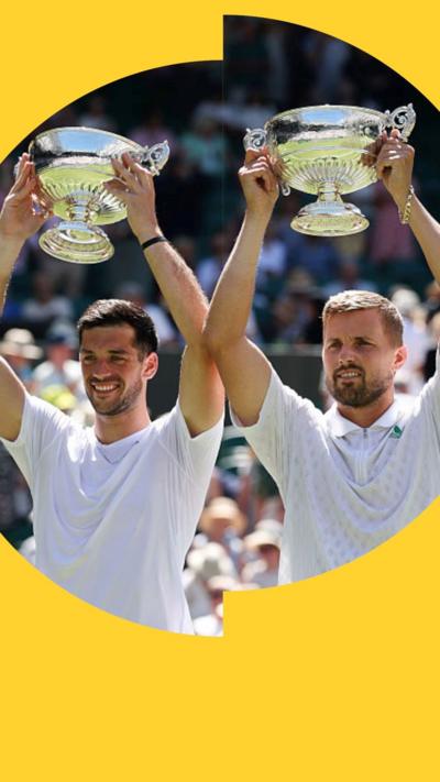 Julian Cash and Lloyd Glasspool holding up trophies 