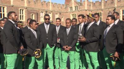 The Fiji rugby squad sang a hymn in front of Hampton Court Palace, on arrival to the UK