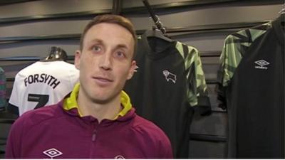 Craig Forsyth in the Derby County club shop meeting fans