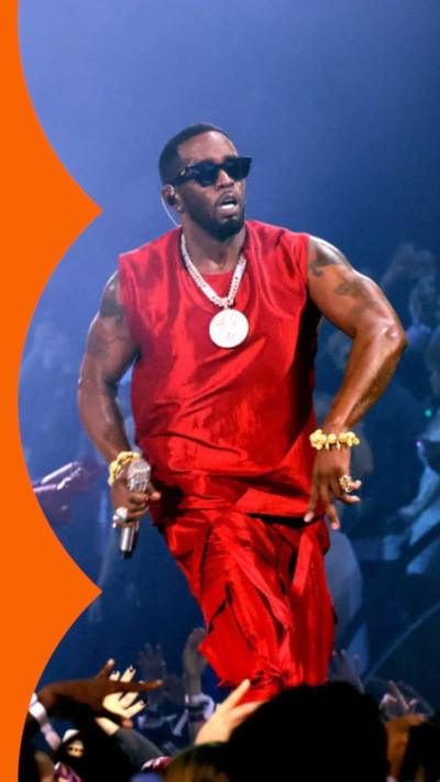 Sean Diddy Combs wearing red and big gold chain, Diddy performs onstage during the 2023 MTV Video Music Awards