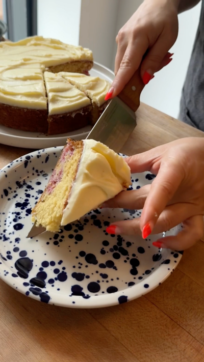 Cake being placed on a plate